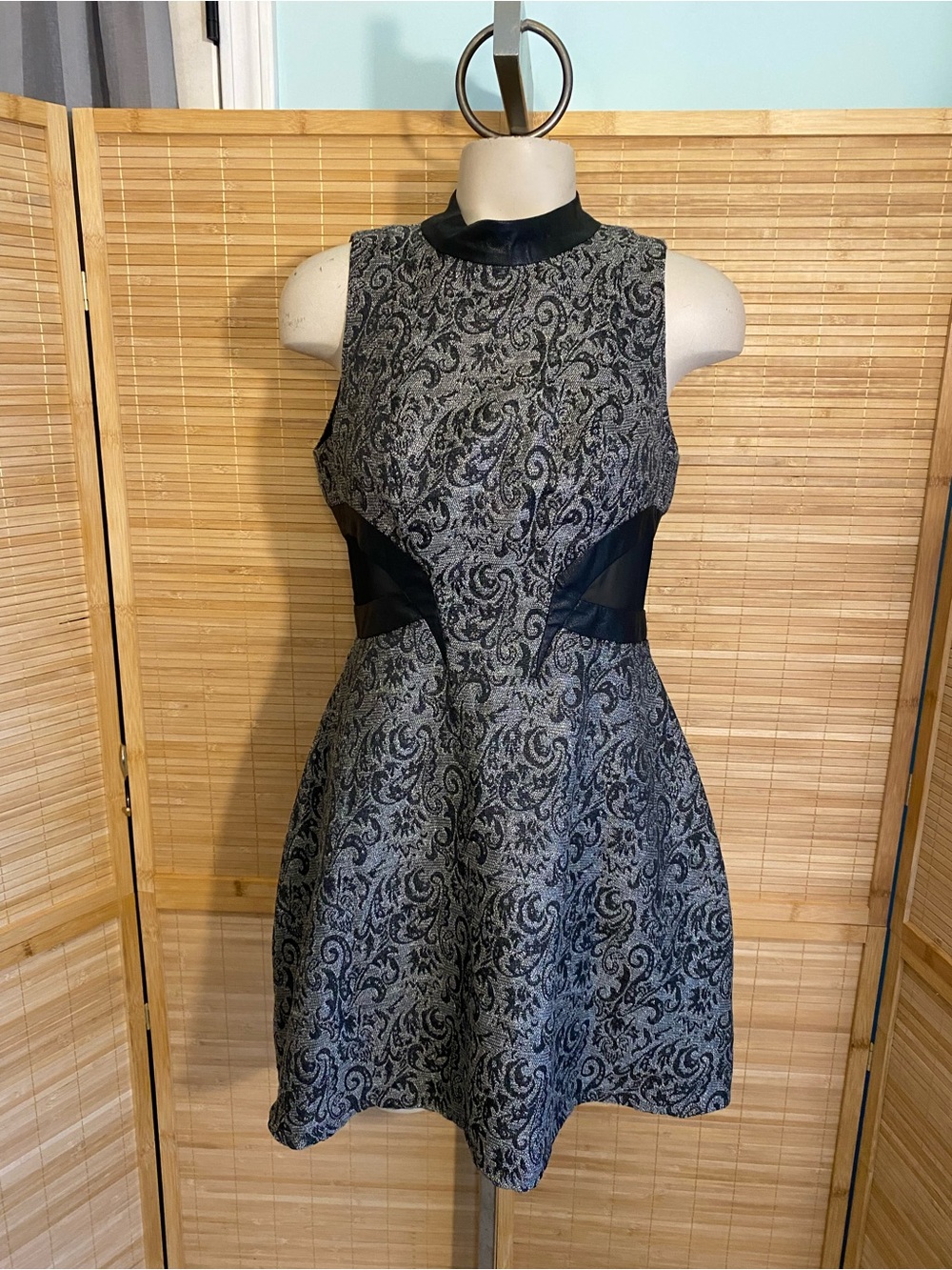BCBGeneration Mini Dress Womens Black Silver Mesh Cut Out sides woman’s size 4